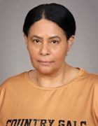 en person med gul skjorte